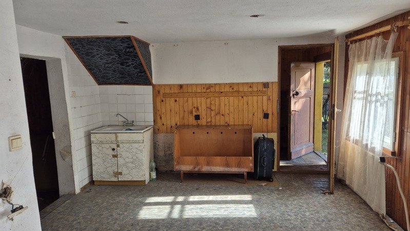 Janowice Wlk. Mały domek drewniany do remontu na działce budowlanej 3055m2