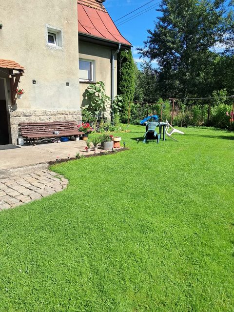 Sprzedam bezczynszowe mieszkanie z ogródkiem w Łomnicy